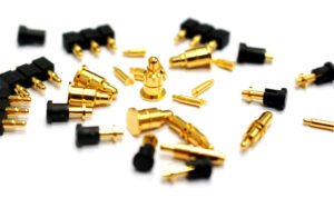 Close-up of pogo pin connectors showing spring-loaded contact mechanism in electronic devices